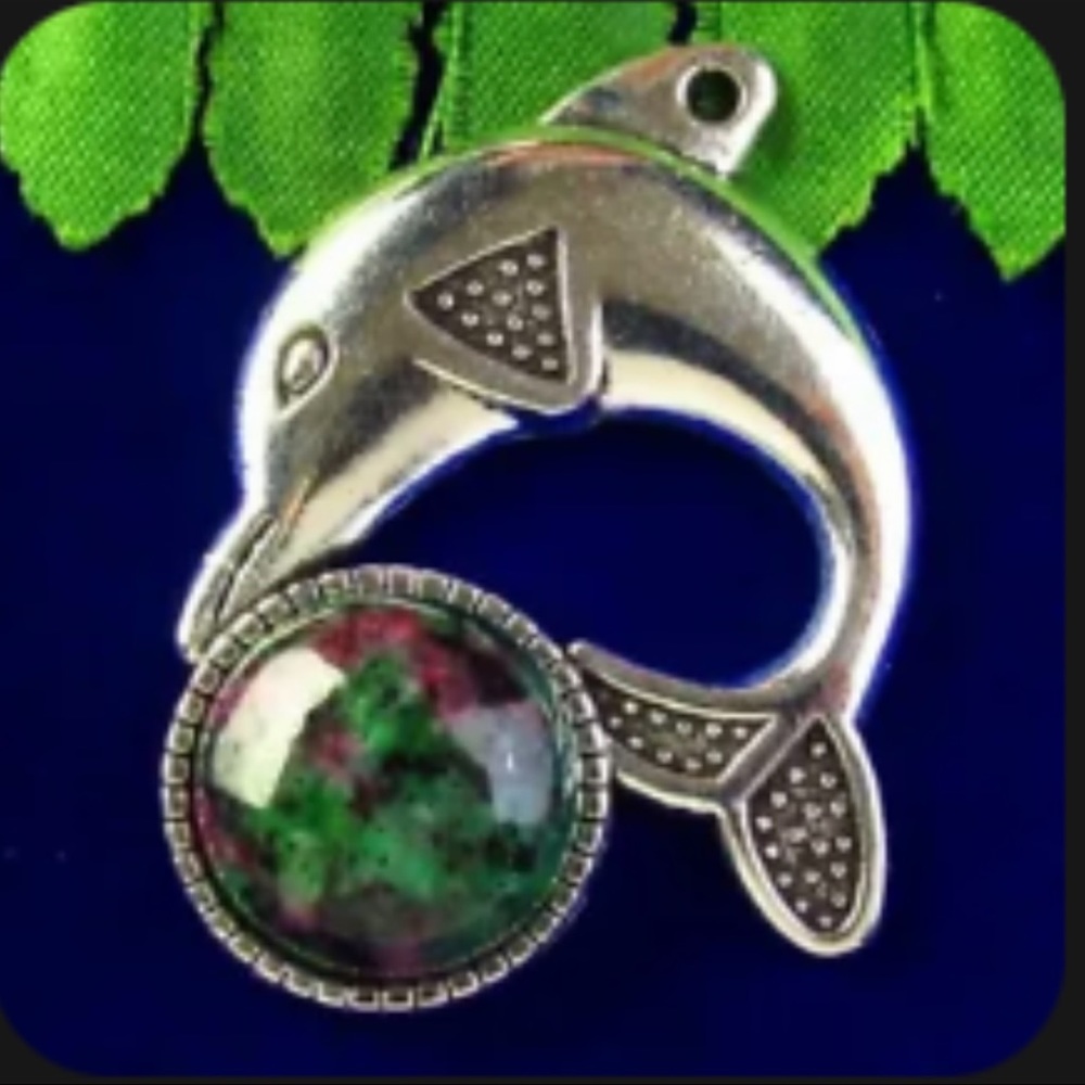 Large Ruby in fuchsite silver dolphin necklace
